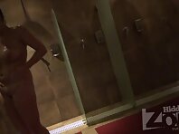 Sh1668#A pretty brunette takes a shower right in front of a hidden camera. When she turns he
