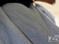 Up1851#A girl in a narrow gray dress. Our operator managed to shoot a close-up her crotch. L