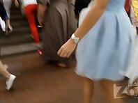 Up2507#Tanned girl in a short blue skirt. Elegant ass and shaved crotch in white blue close-