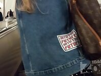 Up2888#Upskirt tanned blonde in a short black skirt. The girl stood with her legs wide apart