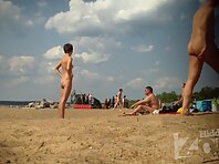 Nu1312#A young pretty woman sunbathing on a nudist beach. Great shots nude beach voyeur. Bea