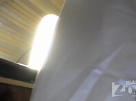 Up2141#Tanned brunette in a wide white skirt. This upskirt filmed by our operator placket. B