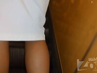 Up2543#Upskirt with a slender woman in a narrow white skirt. Our upskirt master managed to m