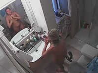 Pv36116#Hiddencam in the bathroom. A hidden camera caught a completely naked tanned blonde wi