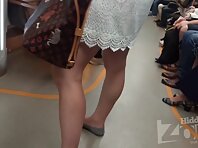 Up4123#Upskirt of a girl in a short white dress. Our cameraman brazenly reached under her sk