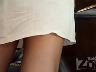 Up2901#Under the skirt of a black girl in a short white dress. Another good model for upskir