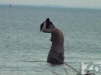 Nu1078#A couple having fun in the water and obviously do not mind to do something hot.