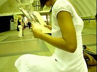 Up1734#Tanned babe in a wide white dress. Beautiful round ass and shaved crotch in white pan