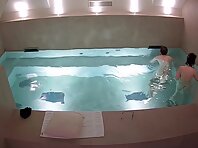 Pv35946#Hiddencam in the pool. A Hidden couple caught a naked couple in the pool.