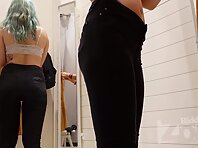 Sp2389#Another beauty went into the fitting room stall. She starts fitting and we can admire