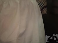 Up2834#A girl in a wide beige dress. Our cameraman filmed on her spy camera her gorgeous ass