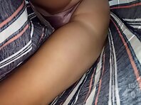 Up2879#Under the skirt of a tanned beauty in a long striped dress. Her shaved crotch in beig