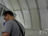 Up2284#The brunette in a short black and white dress. Our cameraman filmed close-up of her r