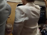 Up2921#Upskirt slim beauty in a short red skirt. Her round tanned ass and shaved crotch in w