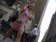 Up4282#Under the skirt of a girl in a short pink dress. Our cameraman managed to catch a clo