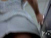 Up2441#Upskirt brunette in a short white skirt. Our operator photographed close-up of her ro