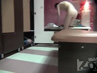 Lo1377#Young beautiful girl dressed in front of the lens of our locker room voyeur cam. She 