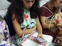 Up2735#Under the skirt of a slim brunette in a wide multi-colored dress. Beautiful round ass