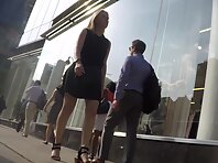 Up4148#Upskirt of a girl in a short black dress. Our cameraman caught a close-up of her roun