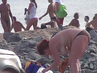 Nu1402#Plump woman with big tits collects things. Her breasts are like two big balls. She do