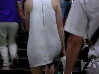 Up2839#Under the skirt of a girl in a short white dress. Our operator managed to make some e