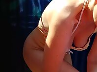 Bc2897#A hidden camera shot a girl dressing a swimsuit through a hole in the wall.