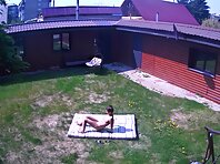Nu2478#A girl decided to sunbathe in the courtyard