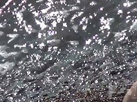 Nu1887#A naked couple sunbathing on the beach. The woman has a chic body and big tits. A man