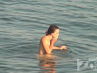 Nu1420#Naked woman continues to frolic under the supervision of a secret nude beach voyeur c