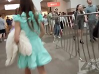 Up4263#Under the skirt of a girl in a loose blue dress. Our cameraman managed to slip his ha