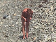 Nu1452#Nude beach voyeur cam continues to secretly watch the nudist beach. People walk, talk