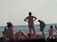 Nu1344#An elegant girl with huge boobs dancing is on the hot sand. Her breasts swaying from 