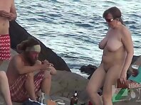 Nu2239#The girl with big boobs briefly went down to the water, and then climbed back onto th