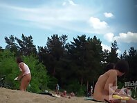 Nu1310#Our operator takes on a nude beach excellent staff nude beach voyeur. Beautiful naked