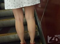 Up4139#Upskirt of a girl in a short white dress. Our cameraman slipped his hand with the cam