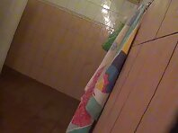 Sh898#Woman smears a cream right in front of the camera in the shower