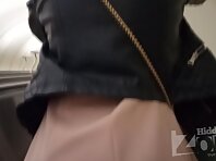 Up2887#Upskirt to a slim girl in a short beige skirt. Gorgeous ass and shaved crotch in whit