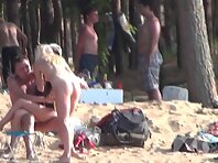 Nu1399#Naked man drinking something. On his knees naked girl. Another naked beauty is standi