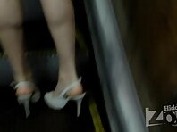Up1820#A girl in a short white dress. My attention was drawn to her shapely legs. Nice ass i