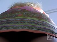 Up2089#Slim blonde in a short orange dress. Our operator several times looked under her skir