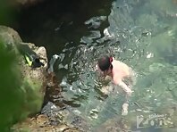 Nu1223#Young babe with glasses for swimming comes out of the water. She's like a mermaid gra