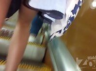 Up2864#Upskirt to a slender girl in a blue skirt. Our operator several times put his hand wi