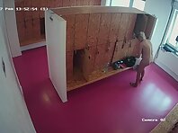 Lo1990#A tall blonde stands naked at her locker. She has a not very beautiful figure, but go