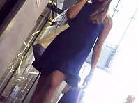 Up4312#Under the skirt of a tanned girl in a loose blue sundress. Our cameraman managed to c
