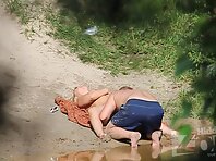 Nu1775#Hidden camera secretly shoots as a couple is engaged in sex in nature. The woman has 