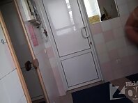 Lo1441#Hidden camera in the dressing room saunas. Young tanned babe took off her bathing sui