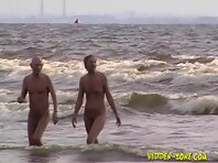 Nu1136#Nudists sunbathe and swim without noticing our operator. And we have the opportunity 