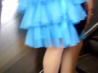 Up1610#Girl in a wide red skirt. Round pimply ass in white thong. Great upskirt.