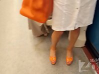 Up2980#Under the skirt of a tanned brunette in a short white dress. Gorgeous tanned ass and 