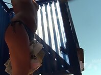 Bc2395#Hidden camera in the beach cabin. A tanned blonde quickly changed her bra. But our ca
